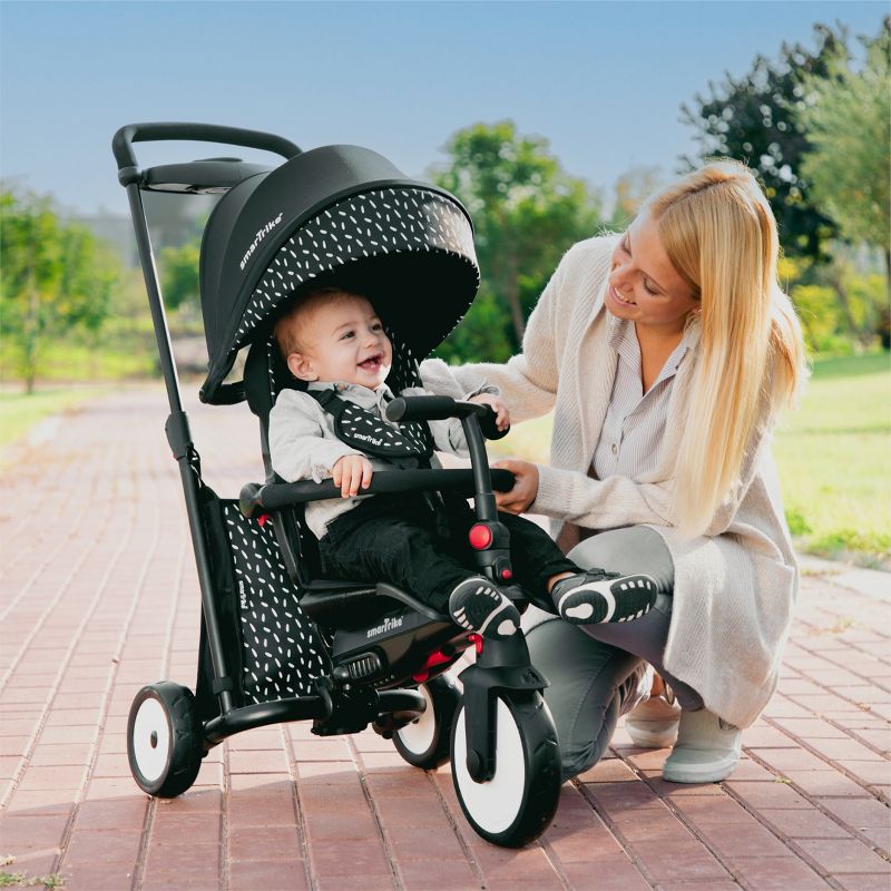 smarTrike STR5 6 in 1 Foldable Toddler Stroller Tricycle Combination with 1 Hand Steering Shock Absorbency and 5 Point Harness, Black and White